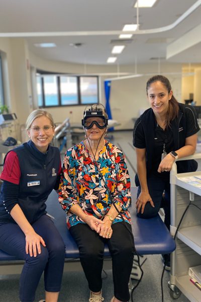 Patient with two Physiotherapists
