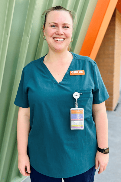 Dr Grace Wagon standing in front of build at Caboolture Hospital
