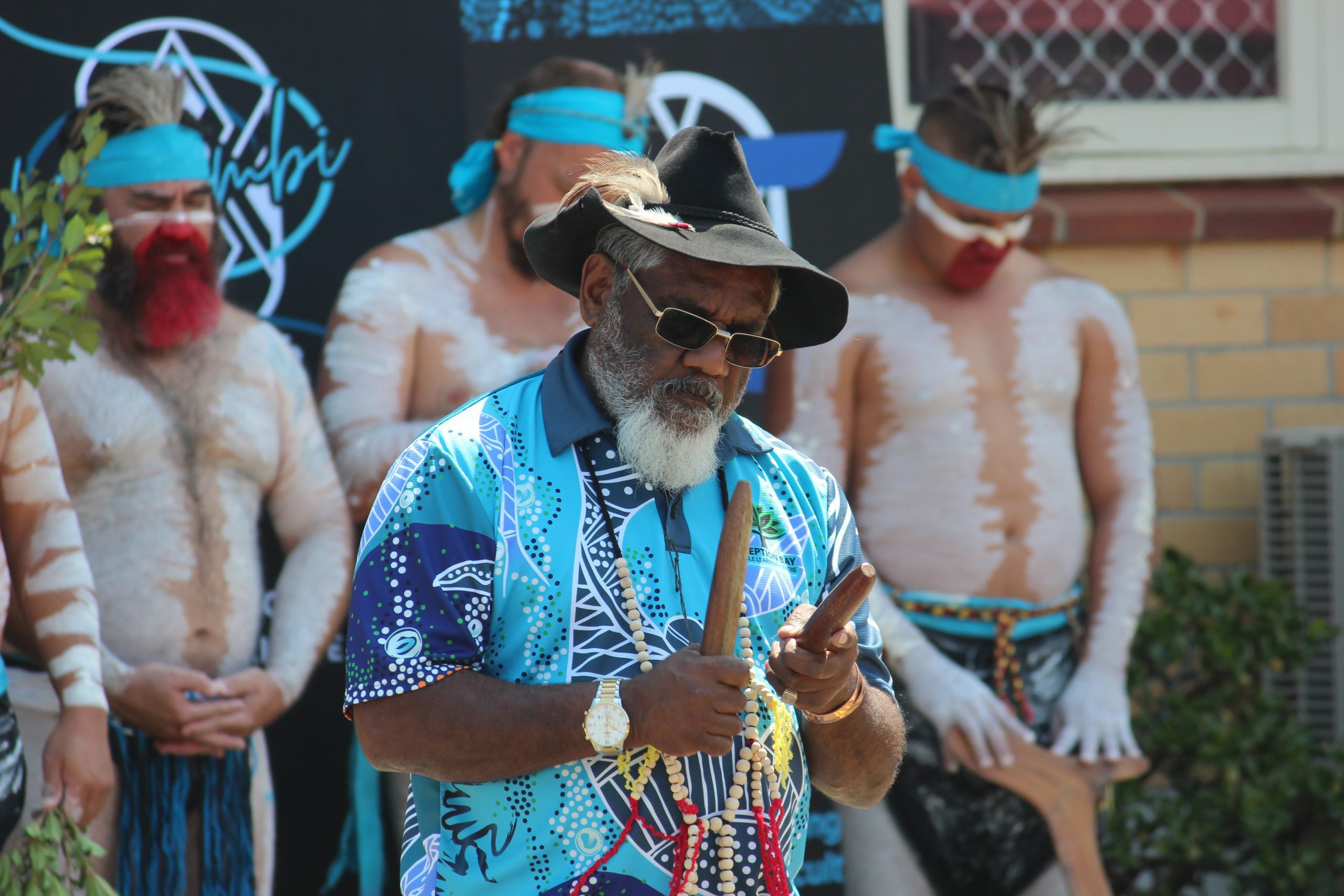 Elder and dancers