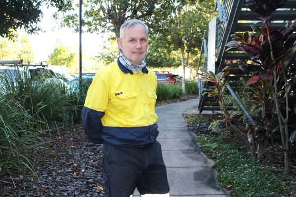 Randall Henry standing in front of garden at North Lakes Health Precinct
