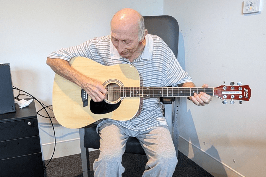 STARS Brain Injury Rehabilitation Unit patient Robert relearning his guitar skills