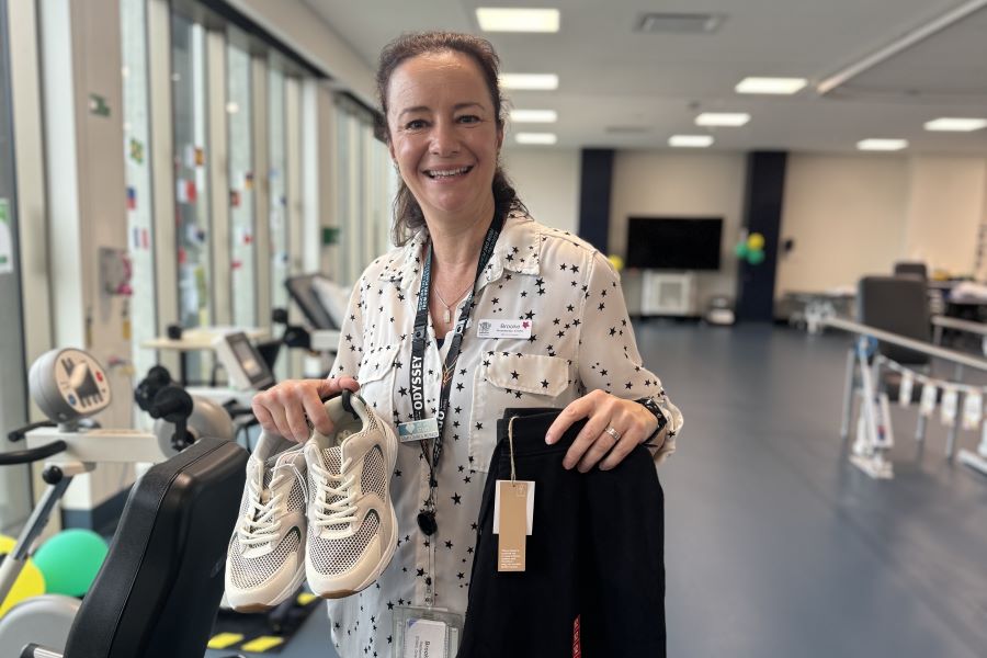Brooke Wadsworth with some of the clothing items available in the 'Dignity at STARS' patient care initiative.
