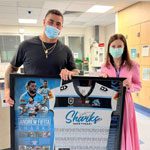 Rugby league legend returns to say thank you to 8AN team