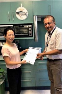Dr Uu Sheraton of Sandgate Dental Clinic