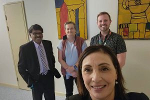Tami Photinos with staff from Mental Health East Wing at TPCH