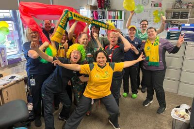 Community Palliative Care Service team in green and gold colours