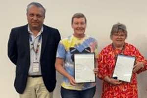 Oral Health Staff Development Day participants holding their awards