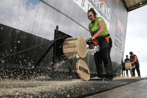 Katrina Cook of Caboolture Hospital competing in a chainsaw event