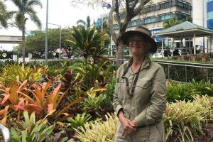 Barb Smithson in front of one of her beautiful garden near the main entrance