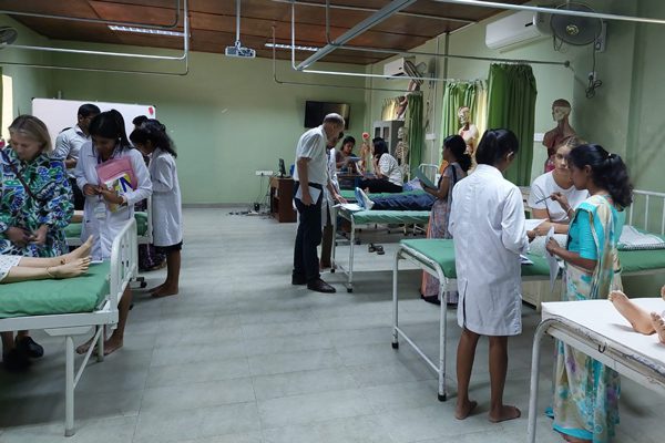 Student pharmacists learning through a mock ward exercise.