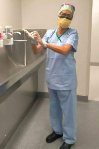 Julie Painter dressed in scrubs