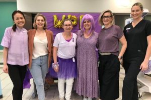 Staff from Neonatal Retrieval Service and the Grantly Stable Neonatal Unit standing in front of their stall at RBWH
