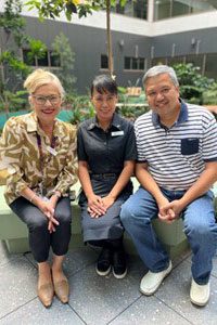 Alanna Geary seated with Mary-Anne and Richard Pineda