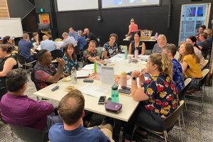 CKW Equity Workshop members sitting around table