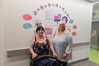 Visitors Lily and Terri on ward 3B, visiting a loved one
