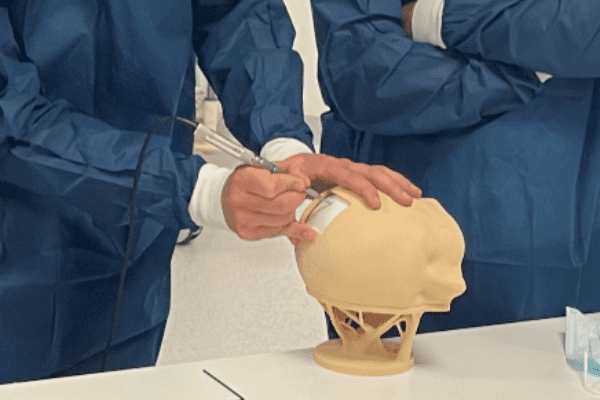 two people with head training model