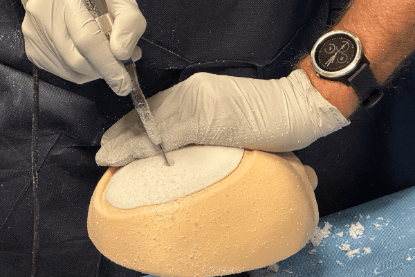 neureotraumatraining 3D printed skull being drilled into