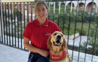 Delta Therapy Dog Olive with her guardian Rosie.