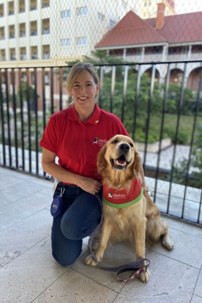 Delta Therapy Dog Olive with her guardian Rosie.