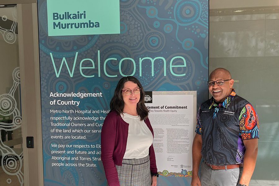 Manager Assets and Infrastructure Ann Birch and Cultural Capability Officer Henry Nona with the newly installed artworks at the Level 3 entrance to STARS.