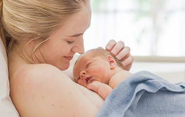 Mother with newborn baby