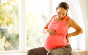 Pregnant women in pink singlet