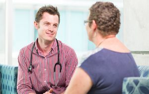 Doctor talking to patient