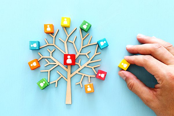Image of wooden tree with people icons