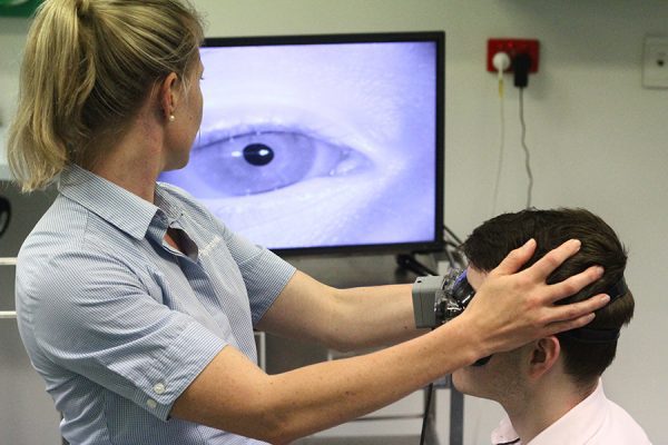 Patient and physiotherapist doing exercises