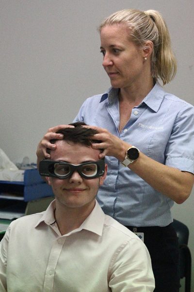 Patient and physiotherapist doing exercises