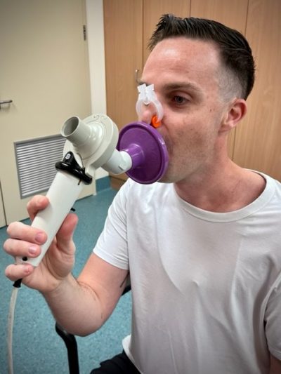 Person with respiratory function mask on