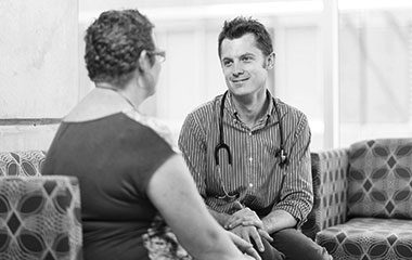 Doctor talking to patient