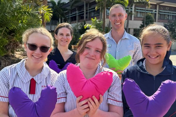 St Benedict’s Catholic Primary School students donating the hand-sewn pillows to Redcliffe Hospital.